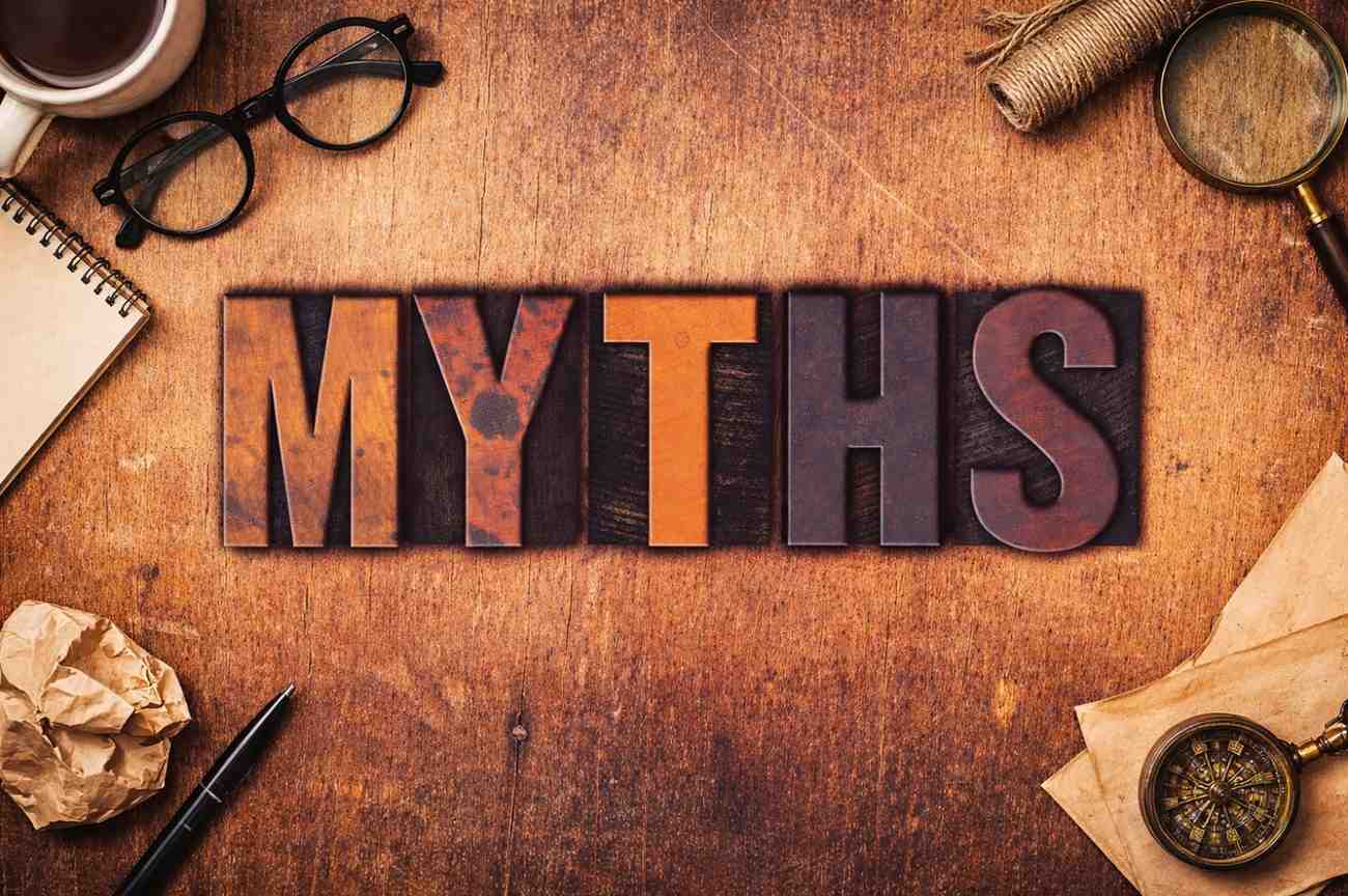 MYTHS written in bold 3D letters on a wooden background